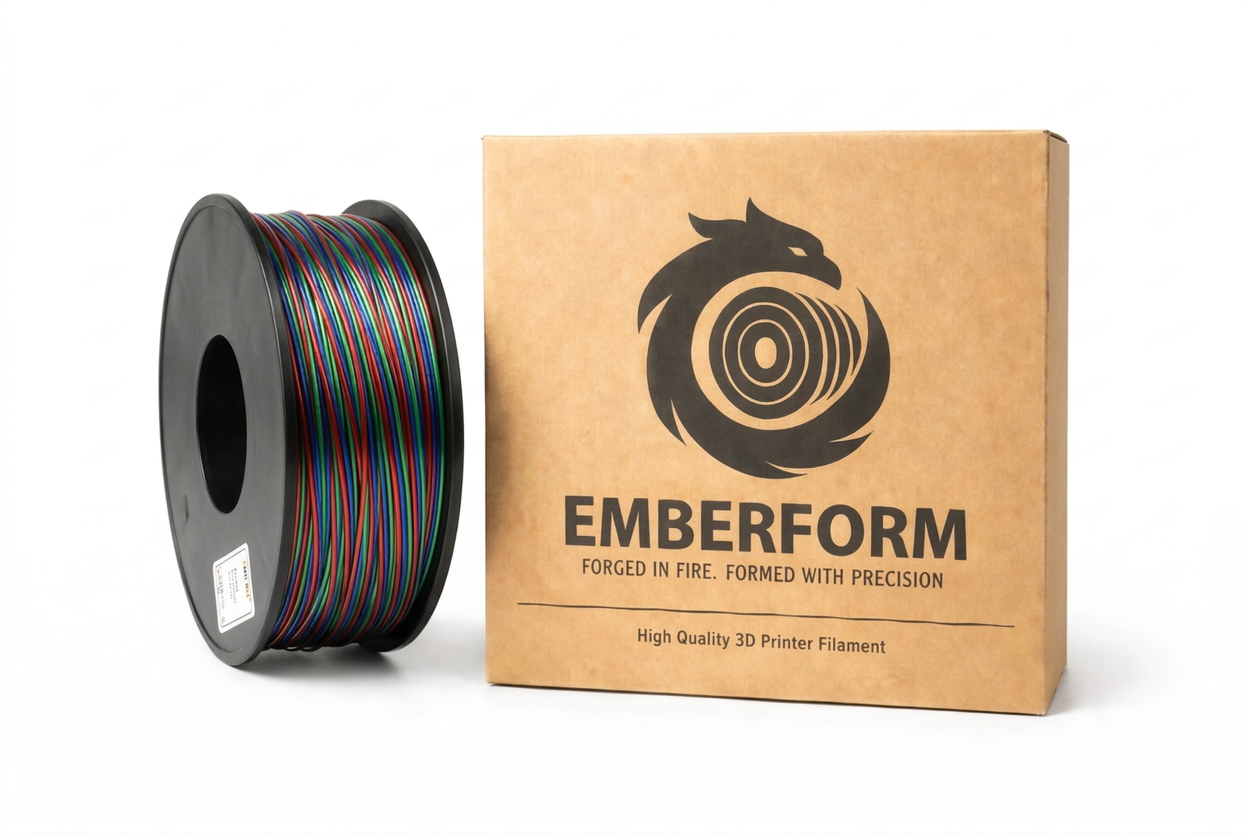 Spool of Tri color Silk PLA Red Green Blue colorful 3D printer filament next to Emberform packaging on a white background